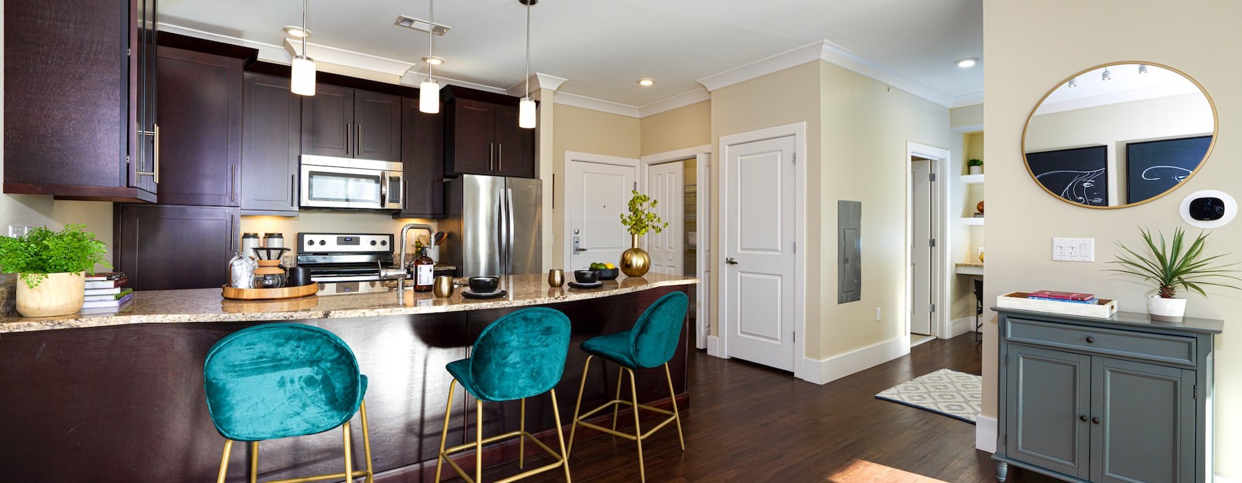 a kitchen with bar stools