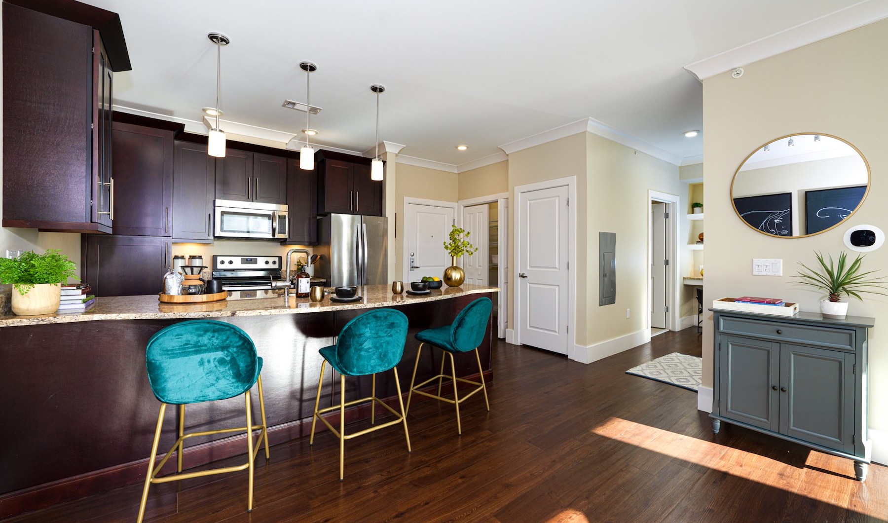 a kitchen with bar stools