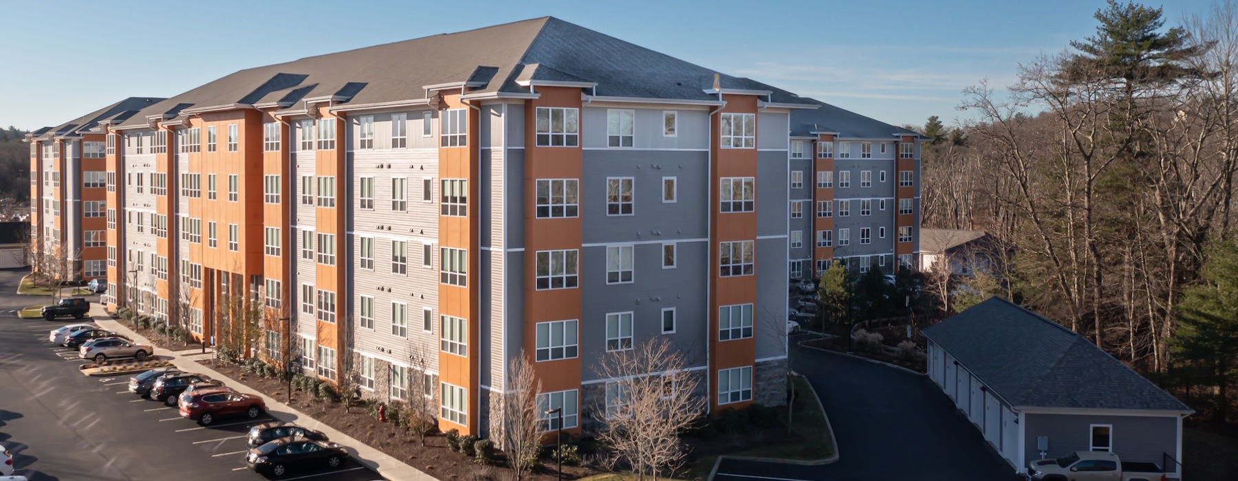 a large building with a parking lot