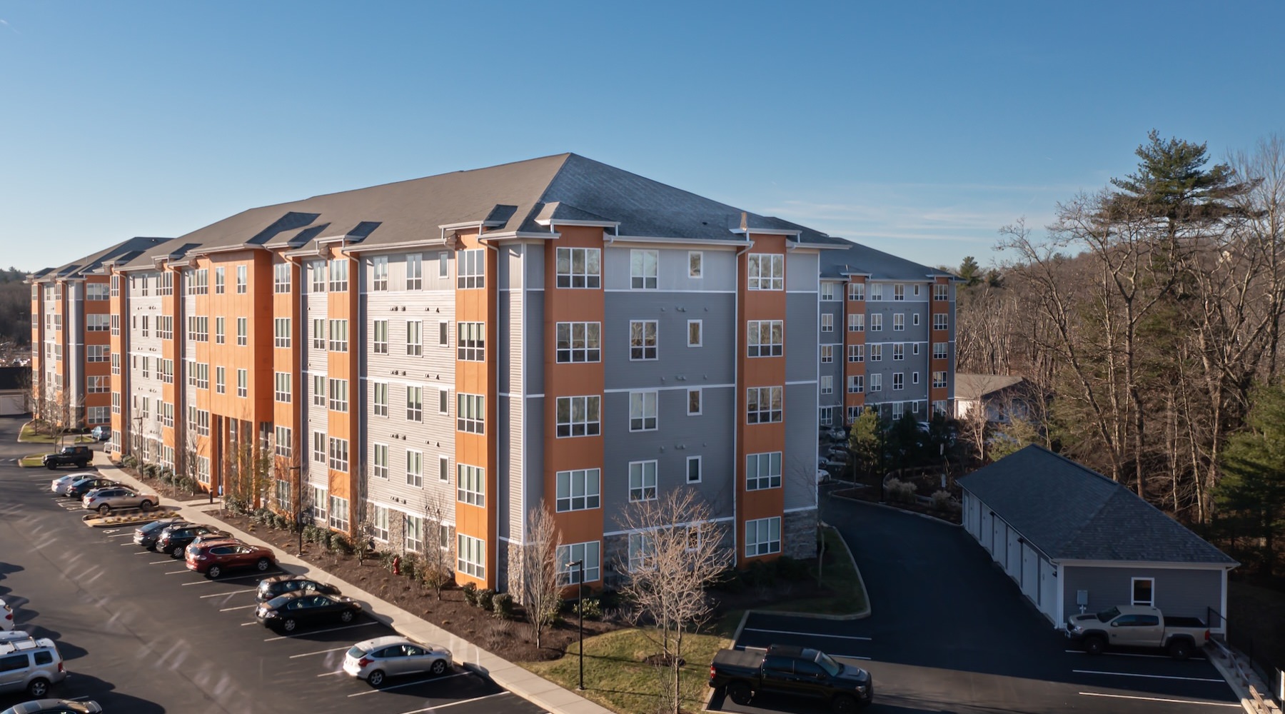 a large building with a parking lot