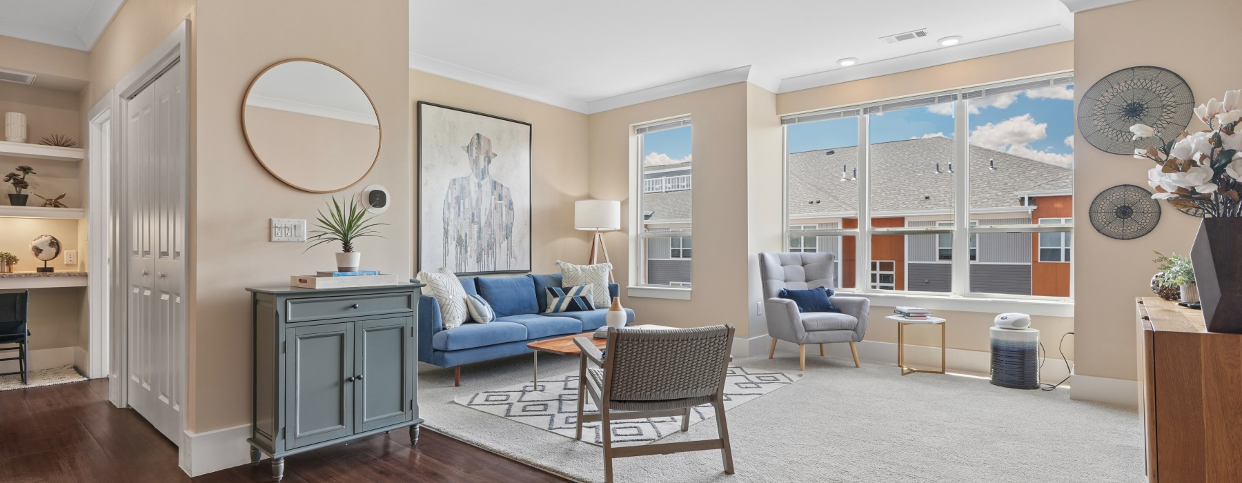 Open concept apartment living room layout with modern finishes at Matrix Hudson